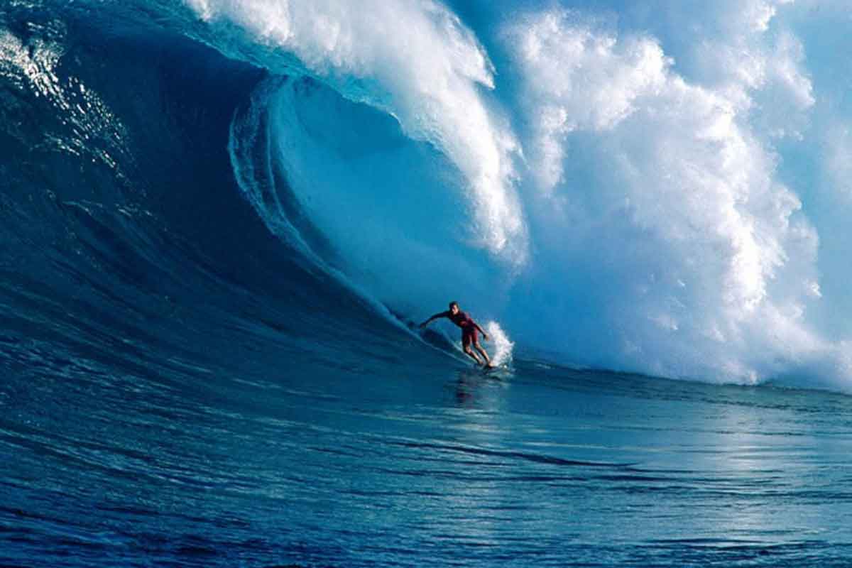 A surfer near the Manhattan Beach strand